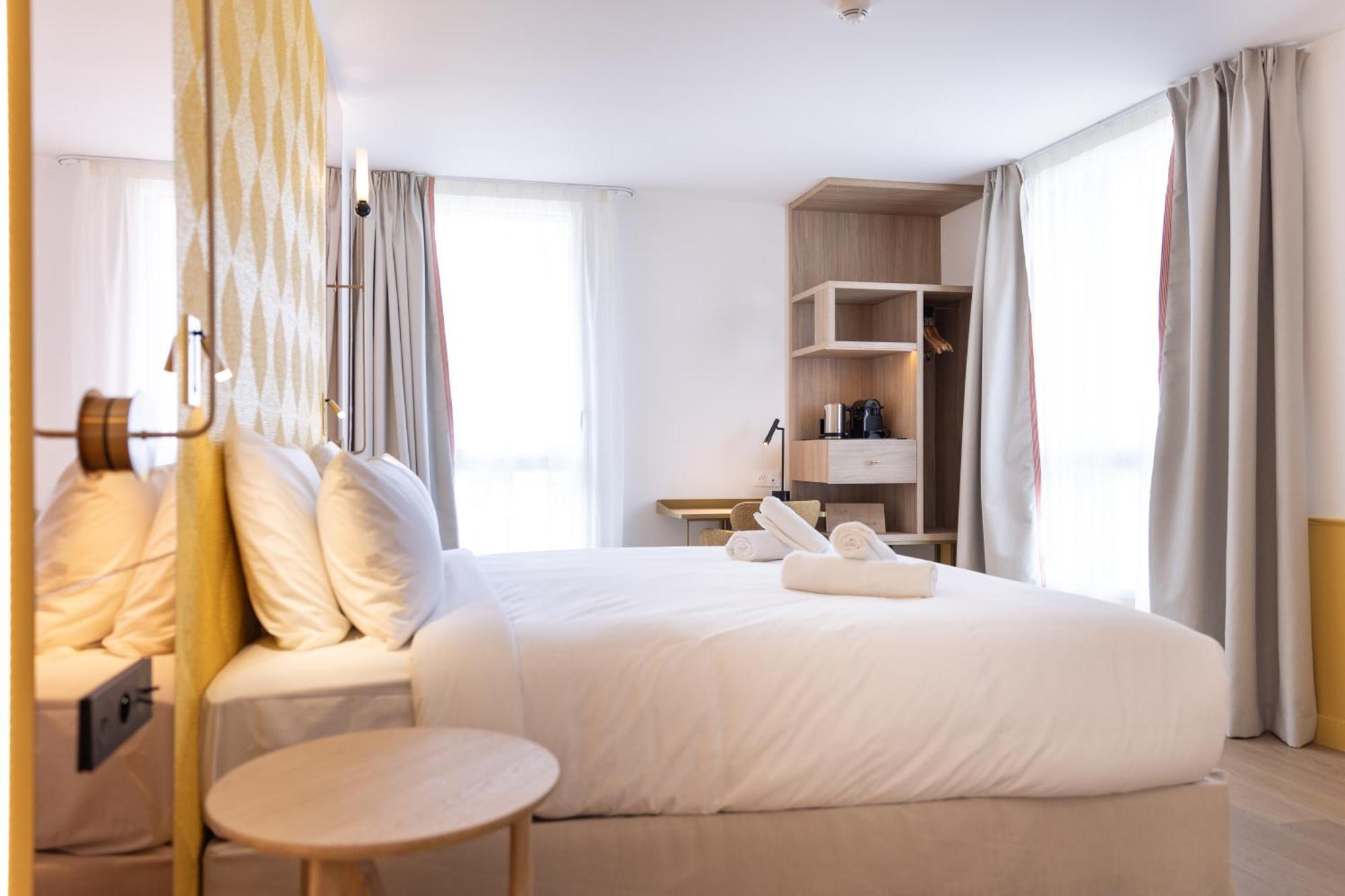 Hotel Kyriad Prestige Paris Asnieres Exterior photo